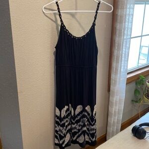 Knee Length dress . It does not have adjustable shoulder straps .